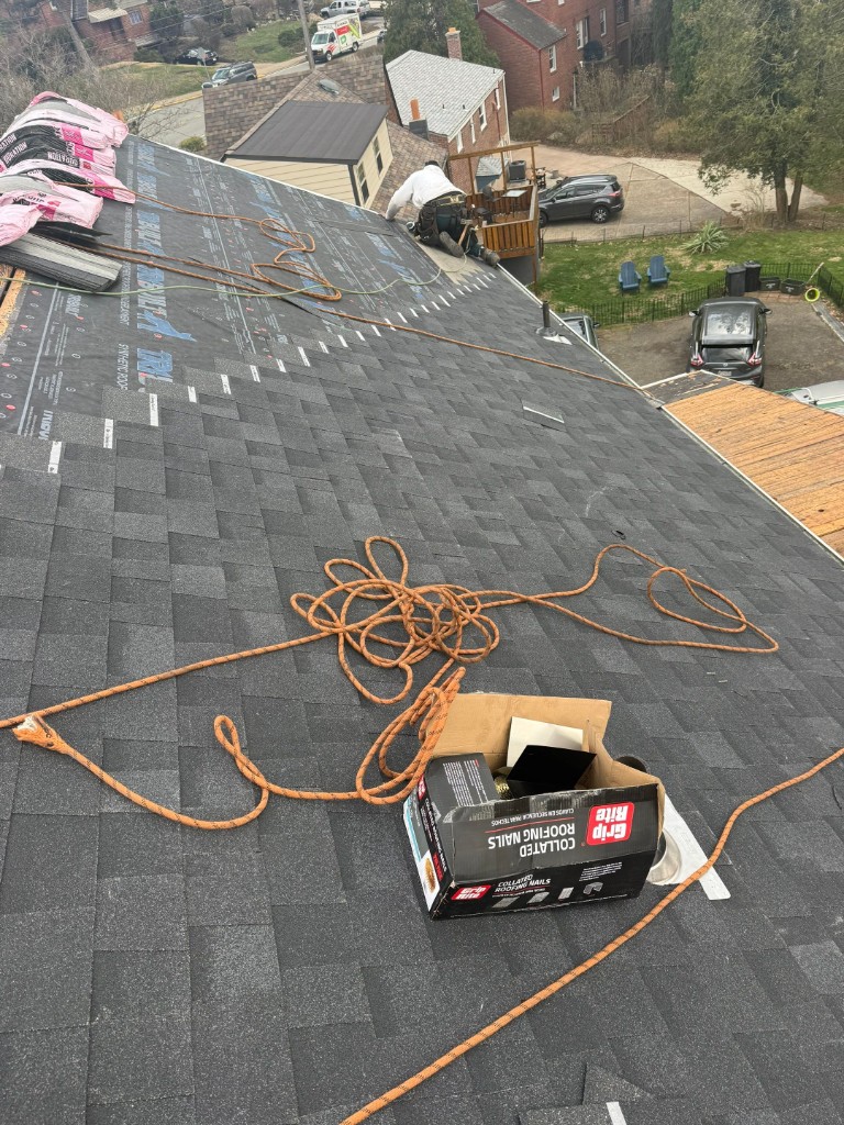 Asphalt shingle roof installation in progress Western PA — TriState Home Consulting Group